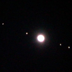 Jupiter and its four large moons